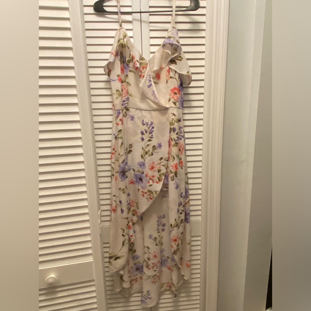 Tan and floral dress , built in shorts , off the shoulder